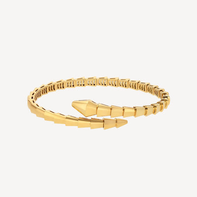 Fleuron Paris Bracelet - 18K Gold Plated Serpenti bangle in coiled form, showcasing intricate scale detailing and timeless sophistication.