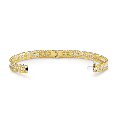 Open view of Fleuron Paris Perlee Bangle - 18k gold plated with zircon, showcasing clasp and inner beaded design for secure wear.