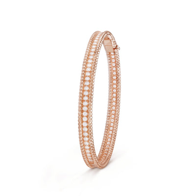 Fleuron Paris Perlee Bangle in rose gold - 18k gold plated with a single zircon row, offering a soft, feminine jewelry accent.