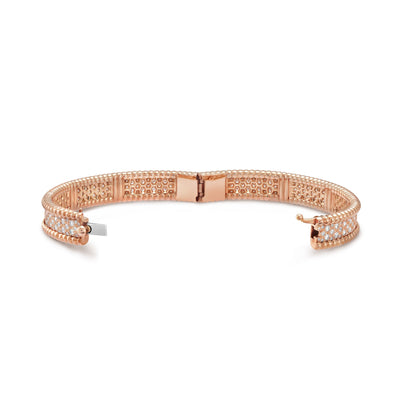 Open clasp view of Fleuron Paris Perlee Bangle in rose gold - 18k gold plated with cubic zircon, showing inner craftsmanship and flexibility.